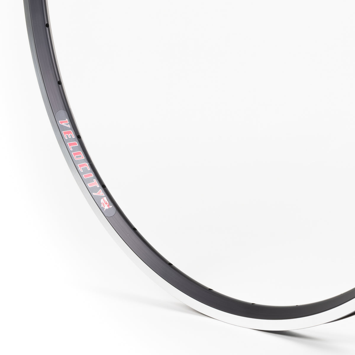 Velocity USA A23 Black Machined Sidewall bicycle rim, close-up shot on a white background