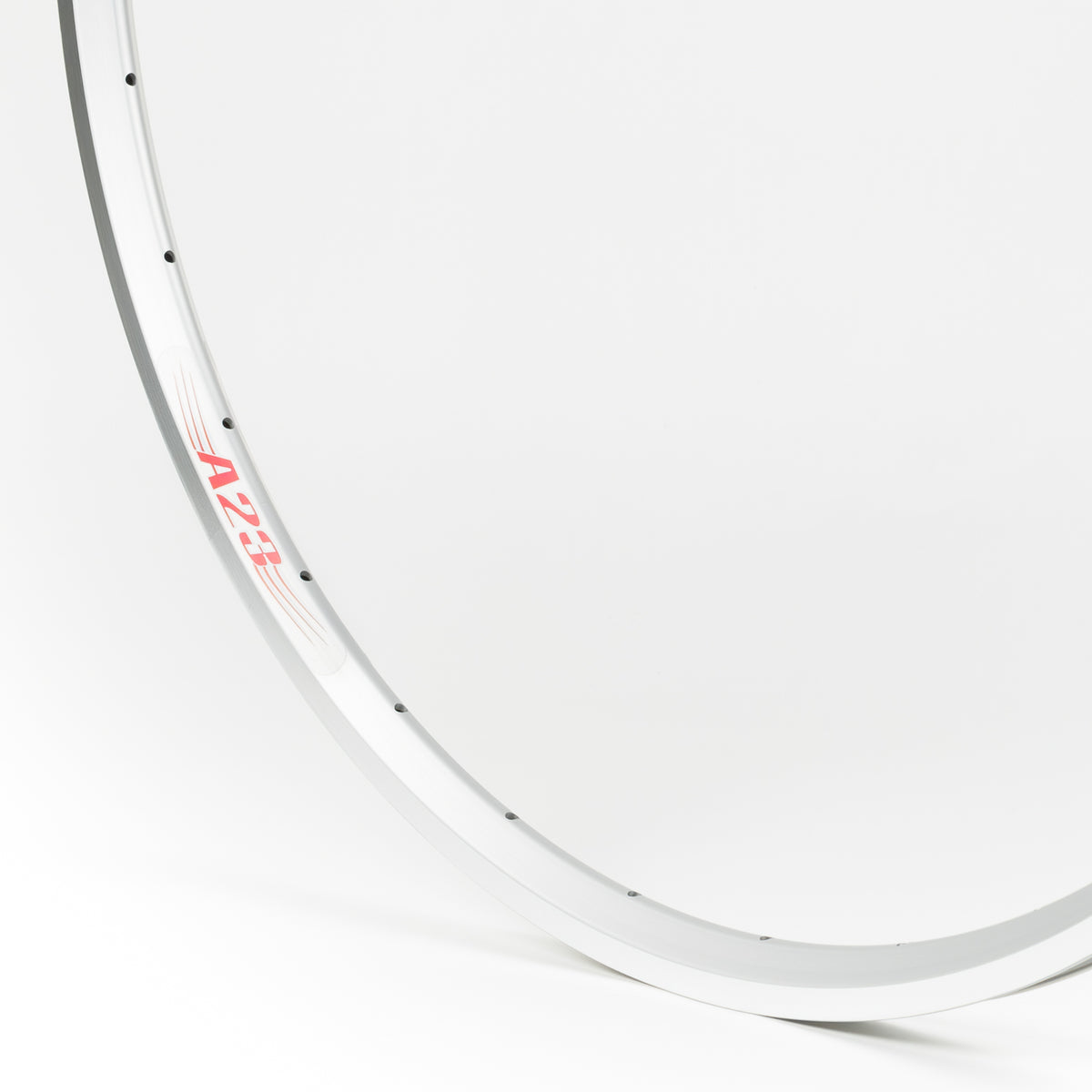 Velocity USA A23 Silver Machined Sidewall bicycle rim, close-up shot on a white background