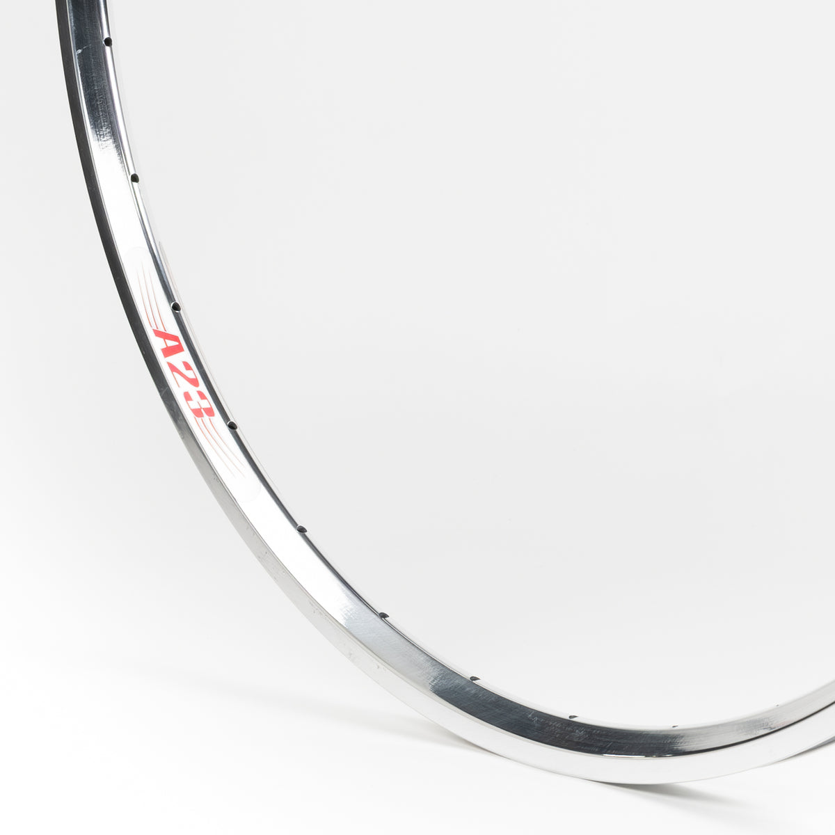 Velocity USA A23 Polished bicycle rim, close-up shot on a white background