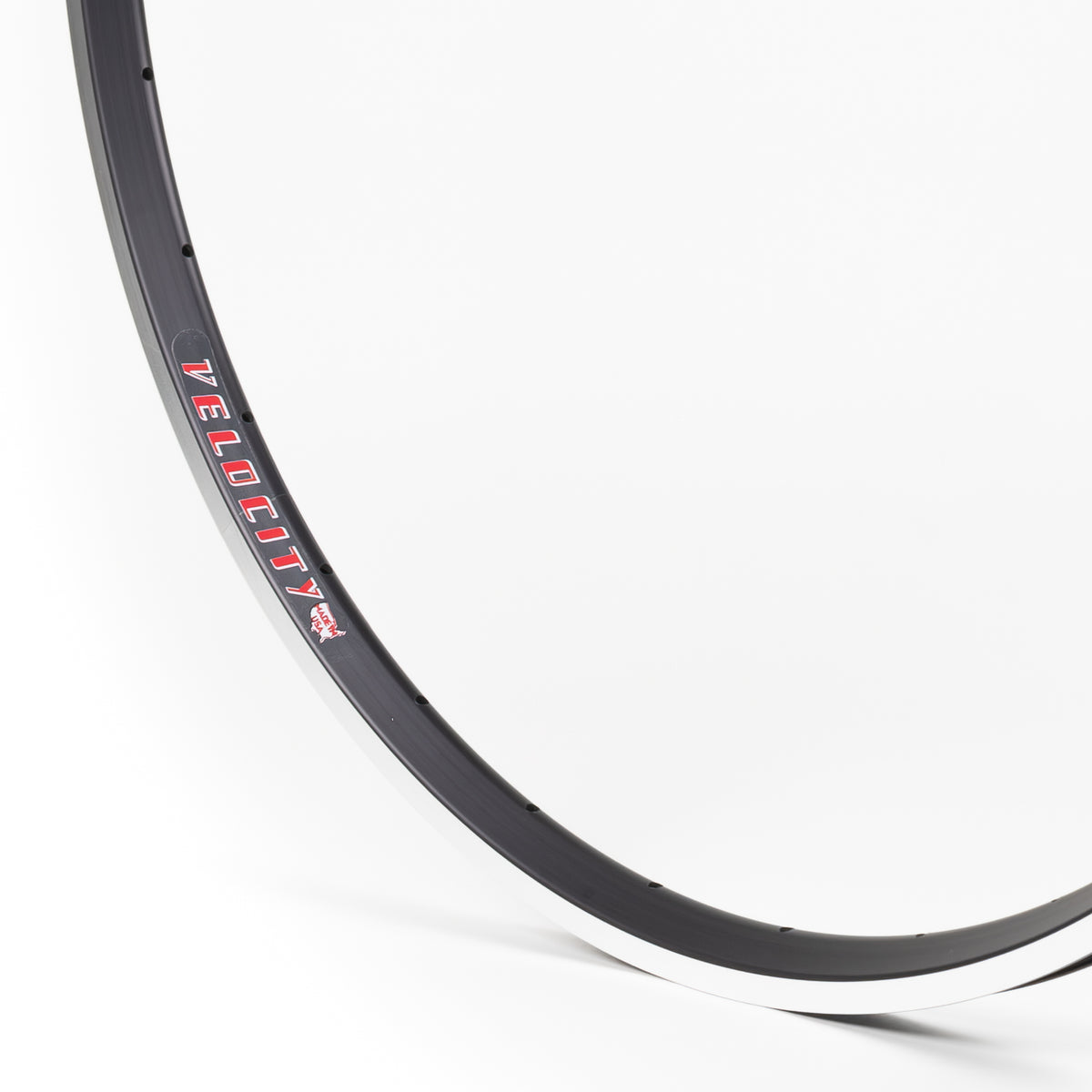 Velocity USA A23 OC Black Machined Sidewall bicycle rim, close-up shot on a white background