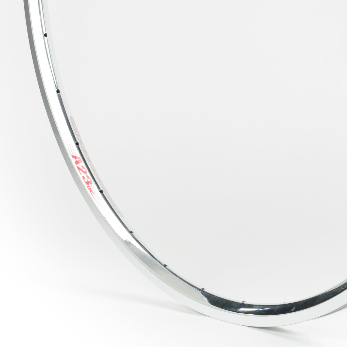 Velocity USA A23 OC Polished Machined Sidewall bicycle rim, close-up shot on a white background