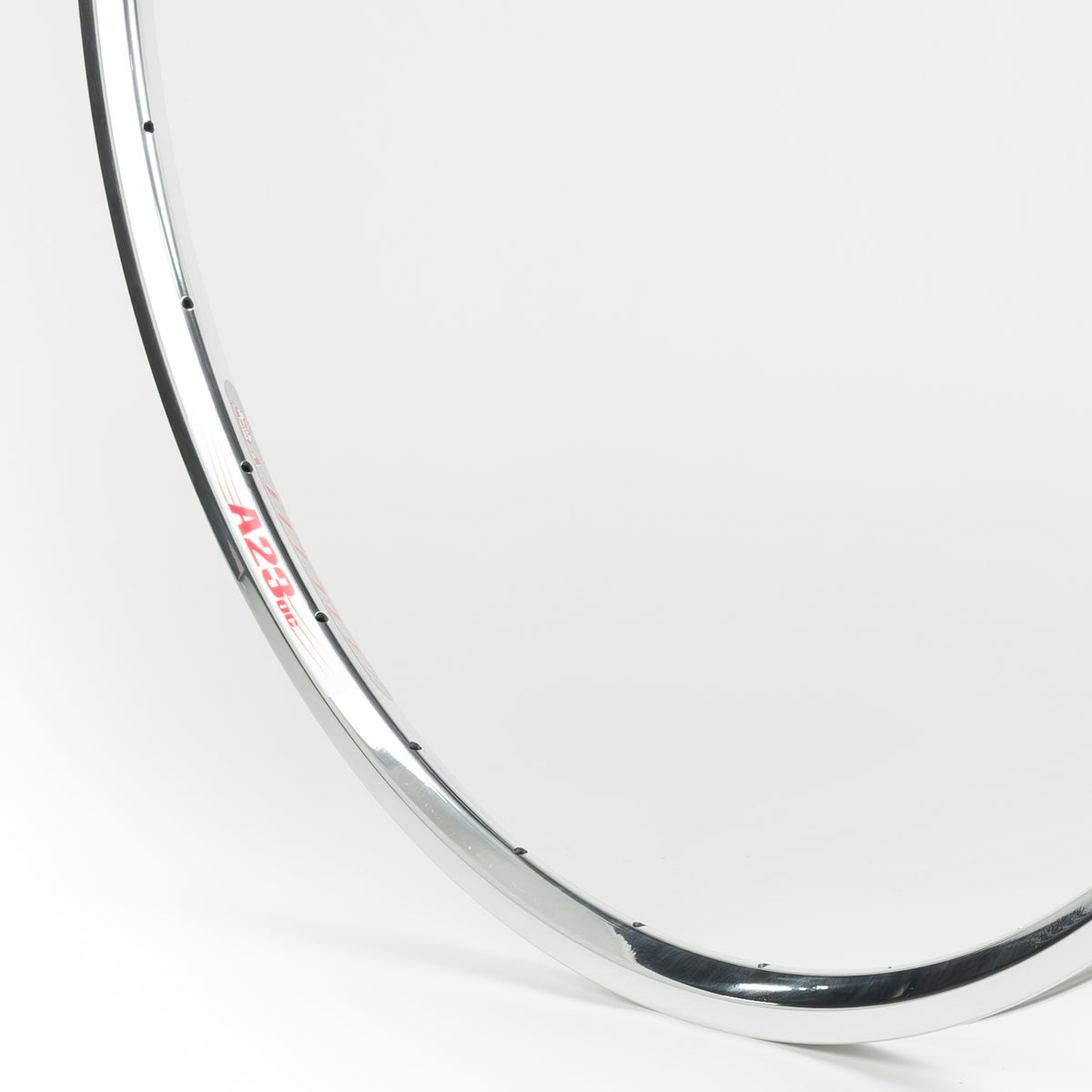 Velocity USA A23 OC Polished bicycle rim, close-up shot on a white background