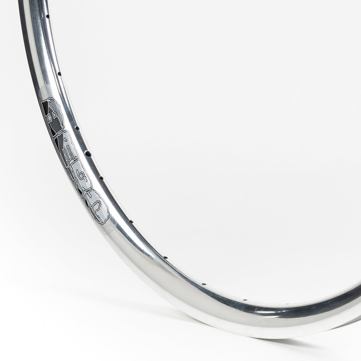 Velocity USA Aero Polished bicycle rim, close-up shot on a white background