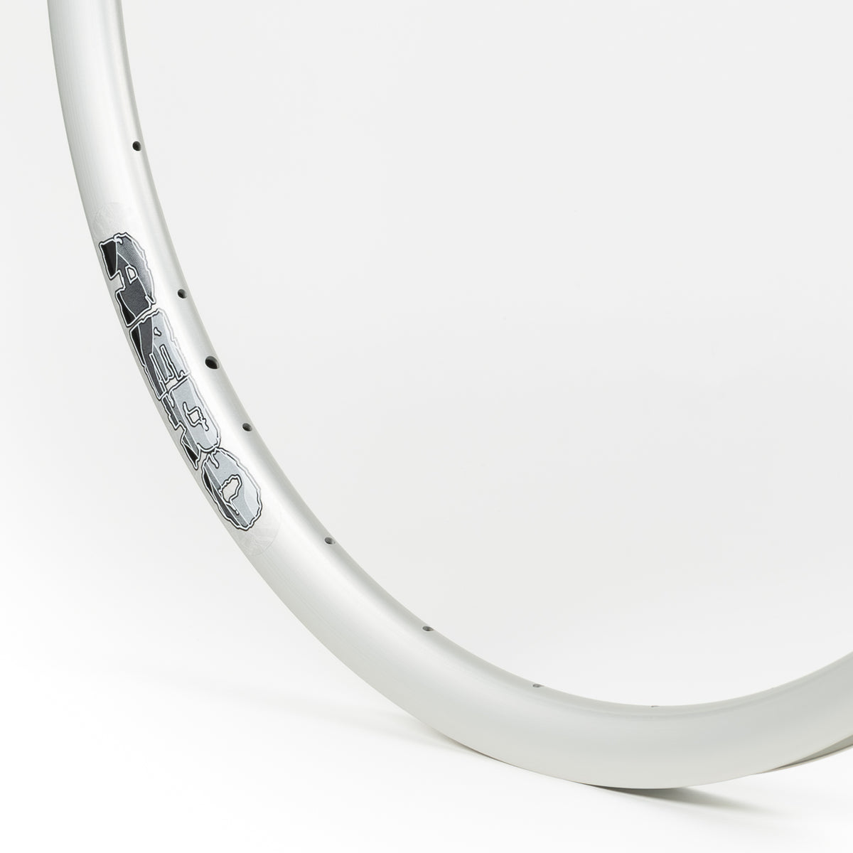 Velocity USA Aero Silver bicycle rim, close-up shot on a white background