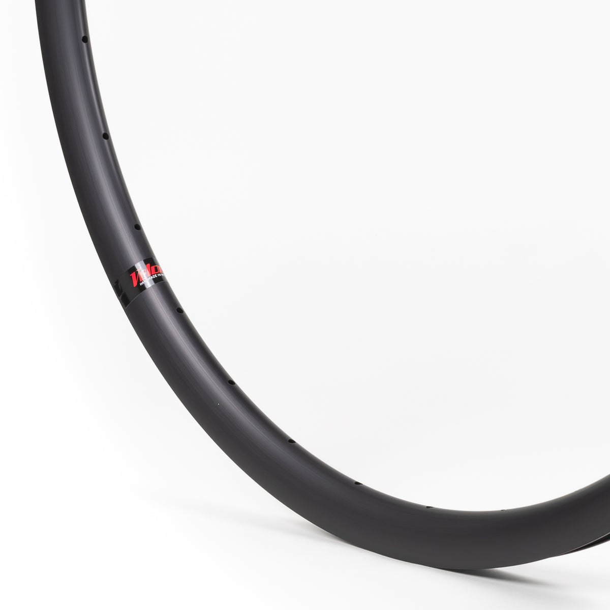 Velocity USA Aileron Black bicycle rim, close-up shot on a white background