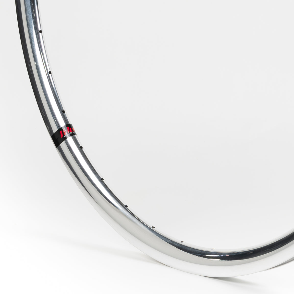 Velocity USA Aileron Polished bicycle rim, close-up shot on a white background