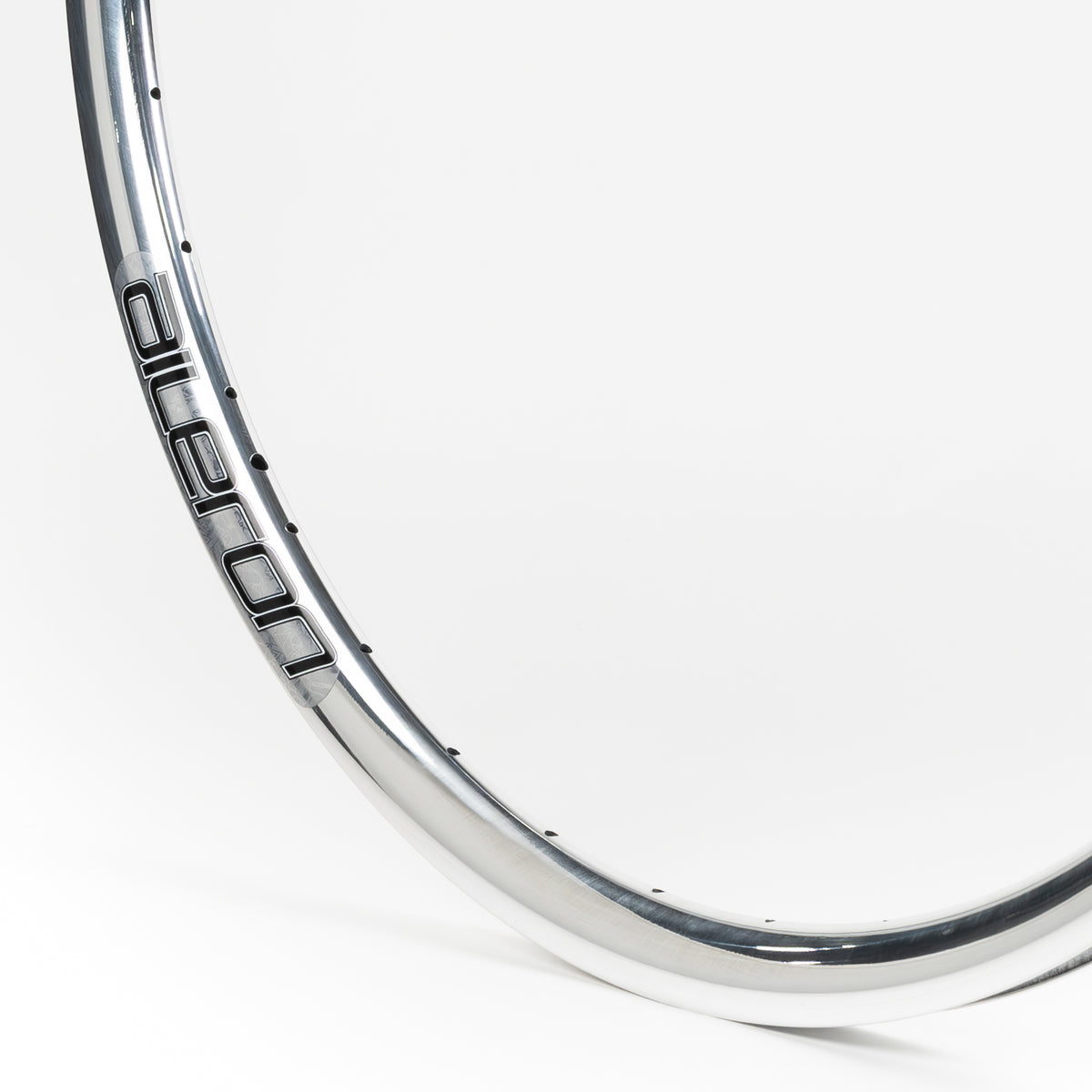Velocity USA Aileron Polished bicycle rim, close-up shot on a white background