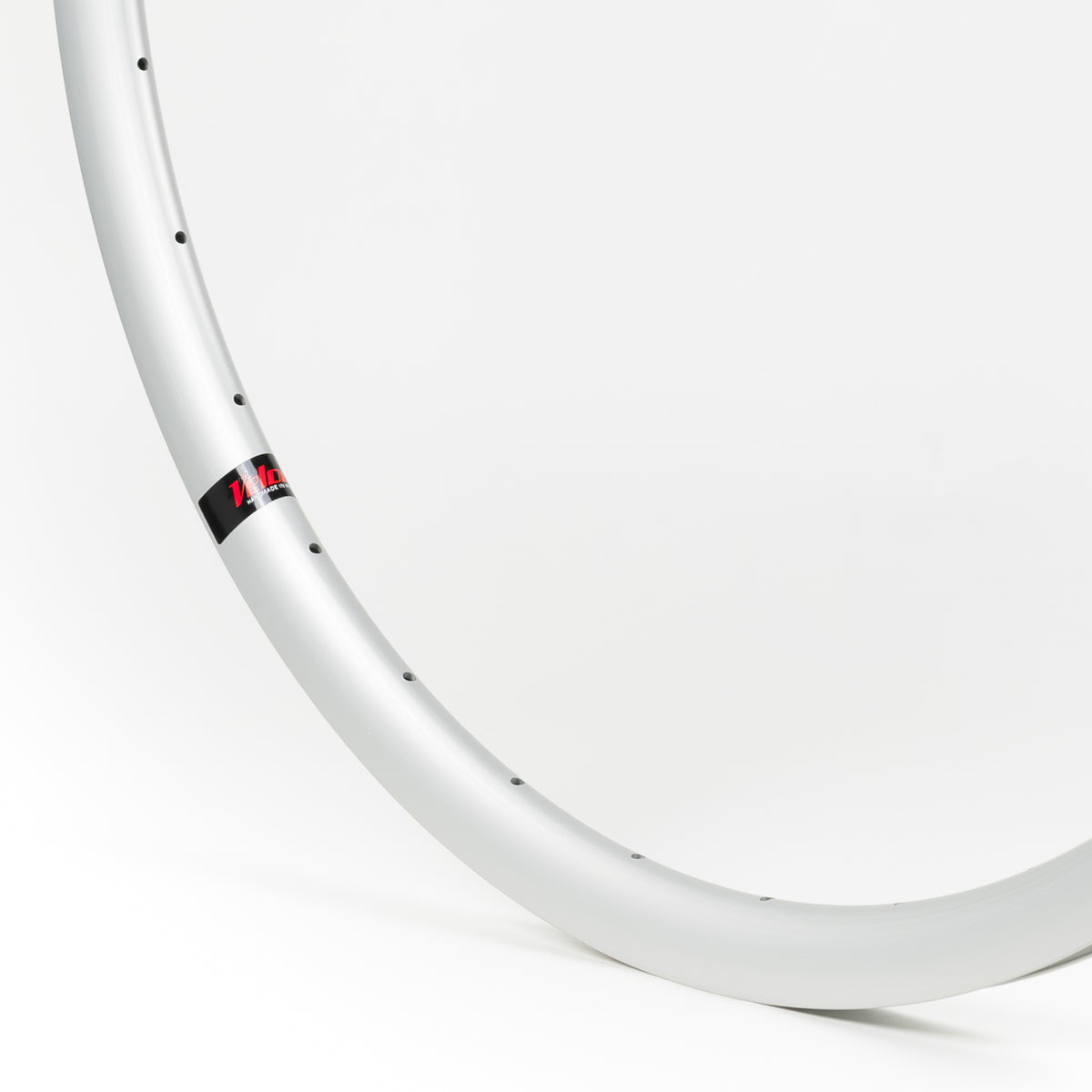 Velocity USA Aileron Silver bicycle rim, close-up shot on a white background
