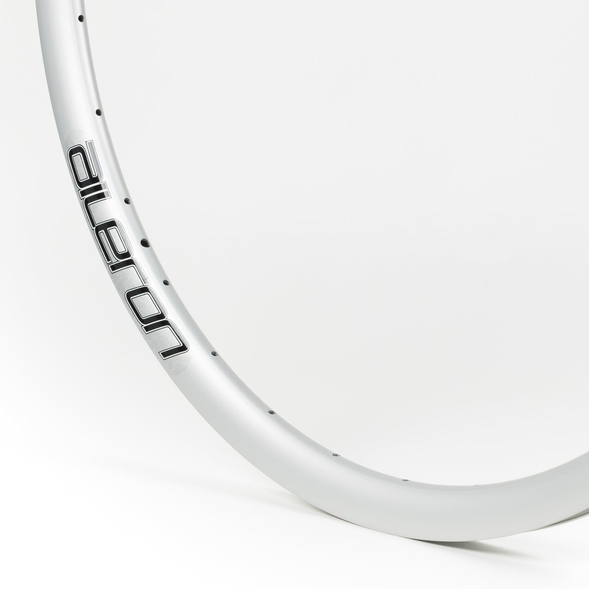 Velocity USA Aileron Silver bicycle rim, close-up shot on a white background