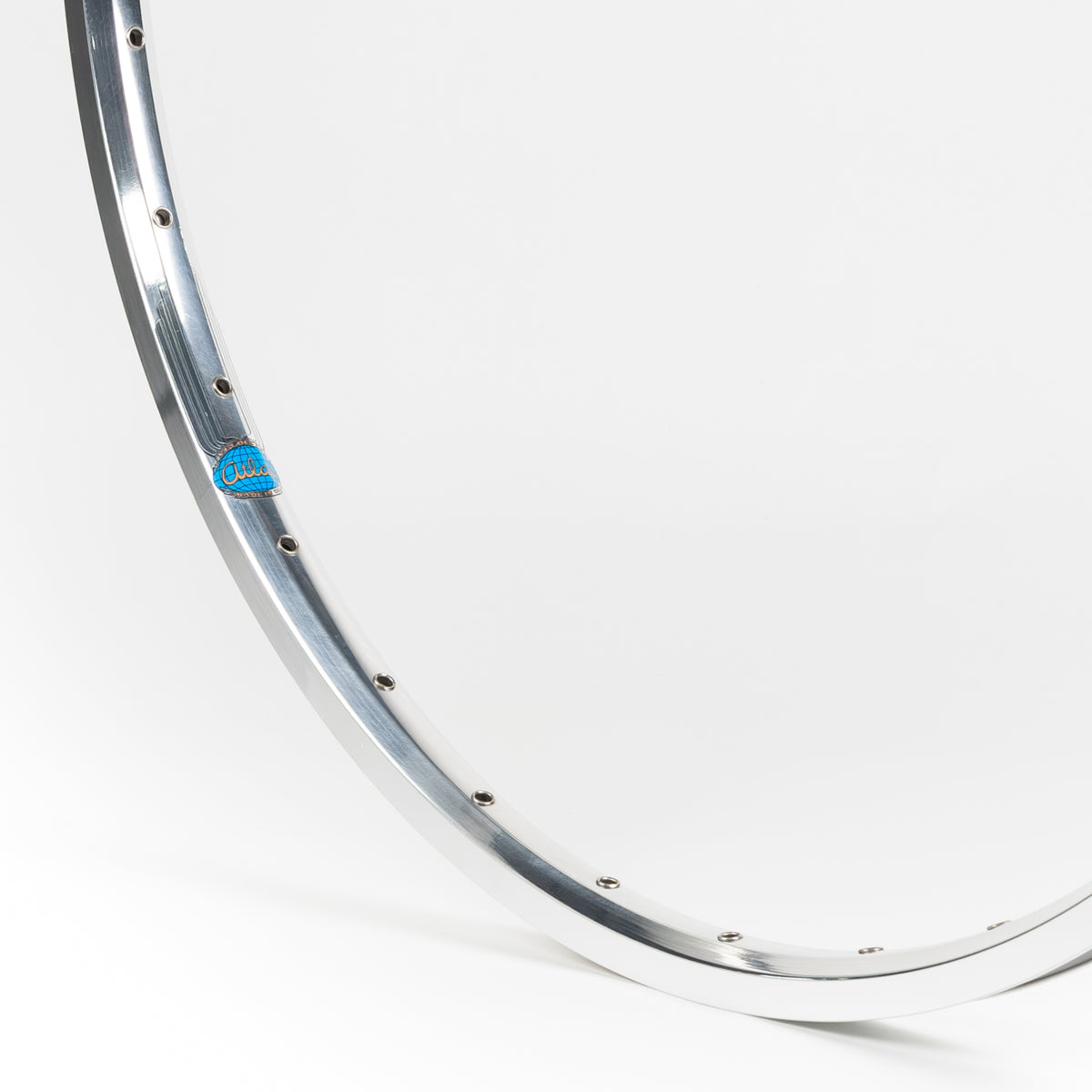 Velocity USA Atlas Polished Machined Sidewall bicycle rim, close-up shot on a white background