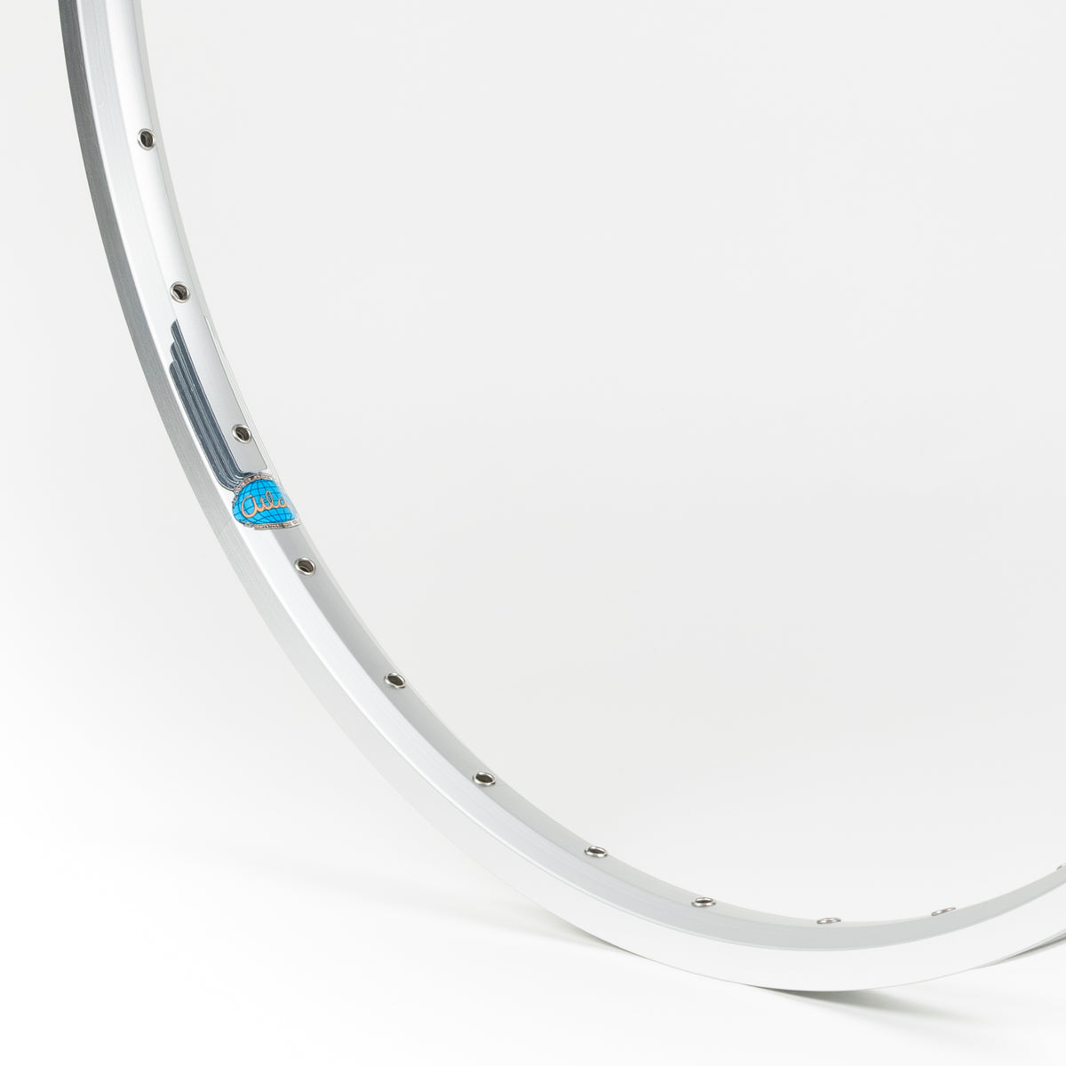 Velocity USA Atlas Silver Machined Sidewall bicycle rim, close-up shot on a white background
