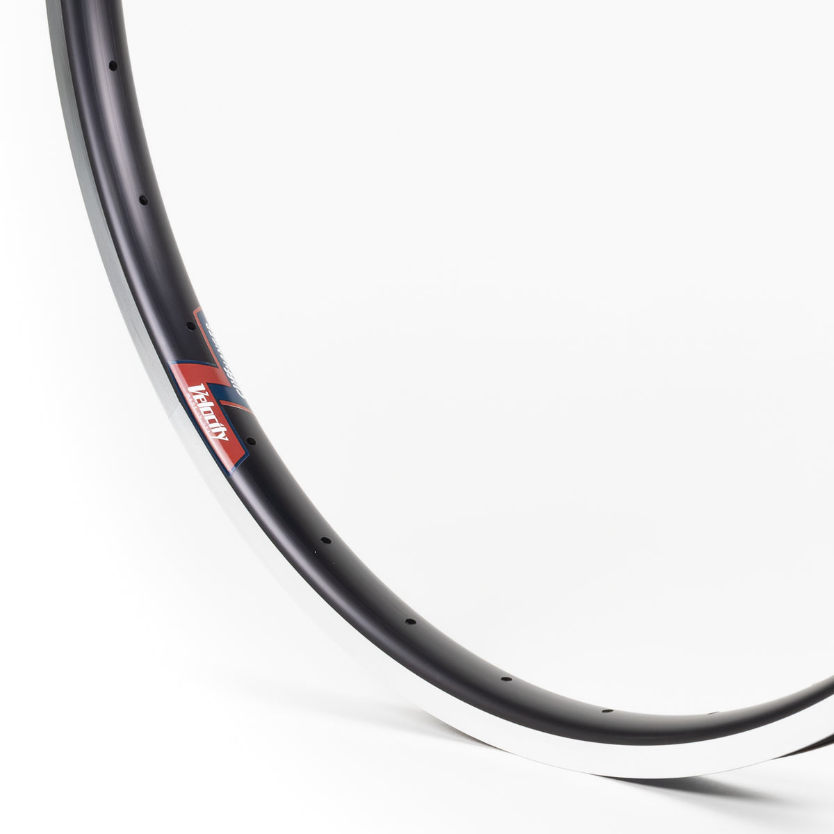 Velocity USA Cliffhanger Black Machined Sidewall bicycle rim, close-up shot on a white background