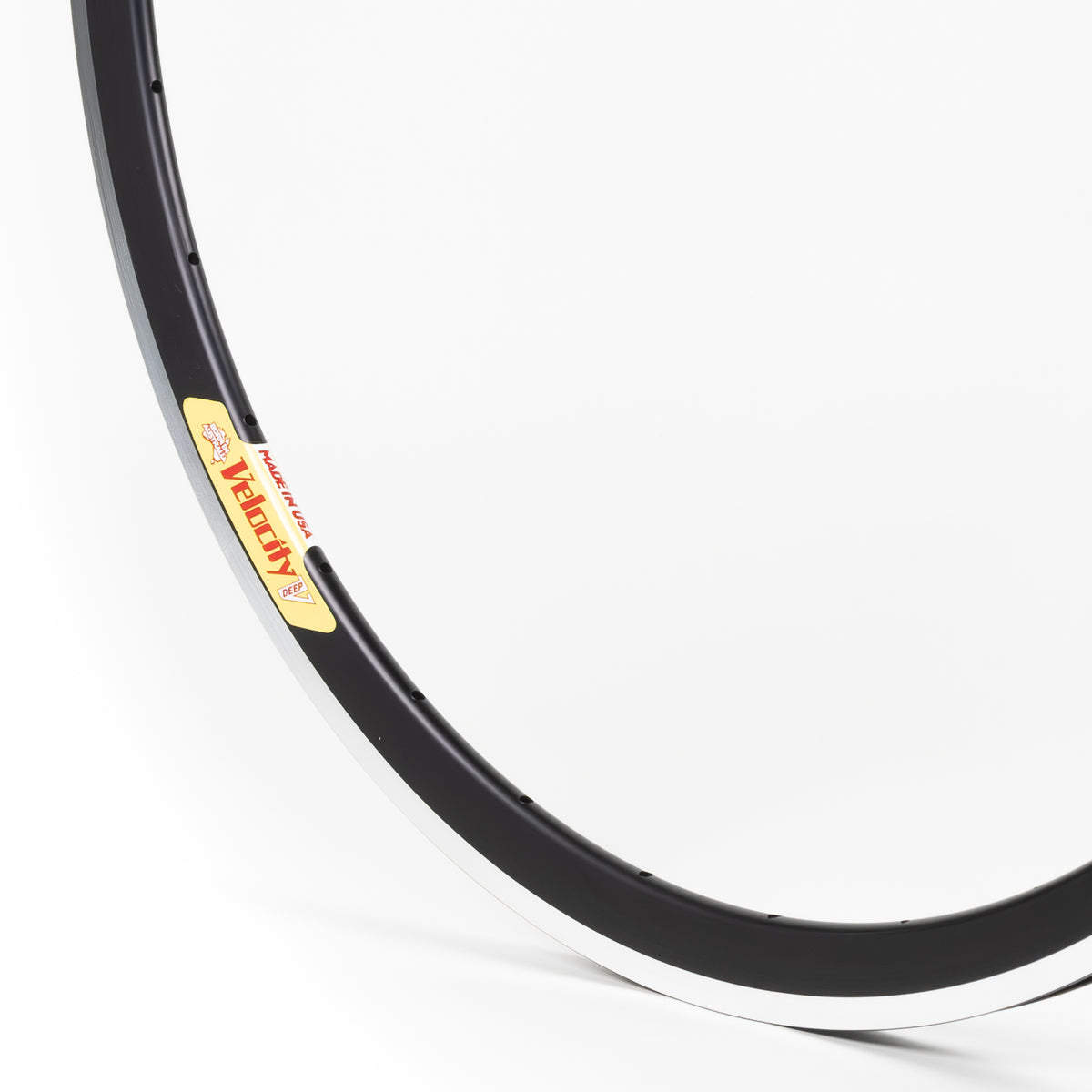 Velocity USA Deep V Black Machined Sidewall bicycle rim, close-up shot on a white background
