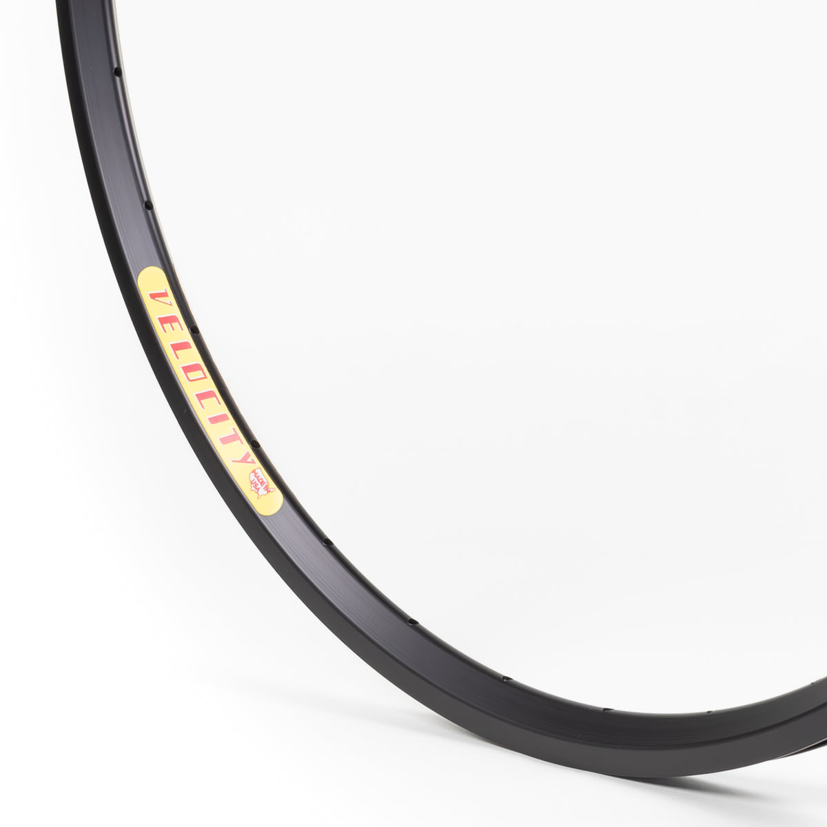 Velocity USA Dyad Black bicycle rim, close-up shot on a white background