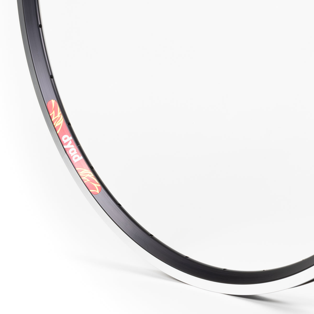 Velocity USA Dyad Black Machined Sidewall bicycle rim, close-up shot on a white background