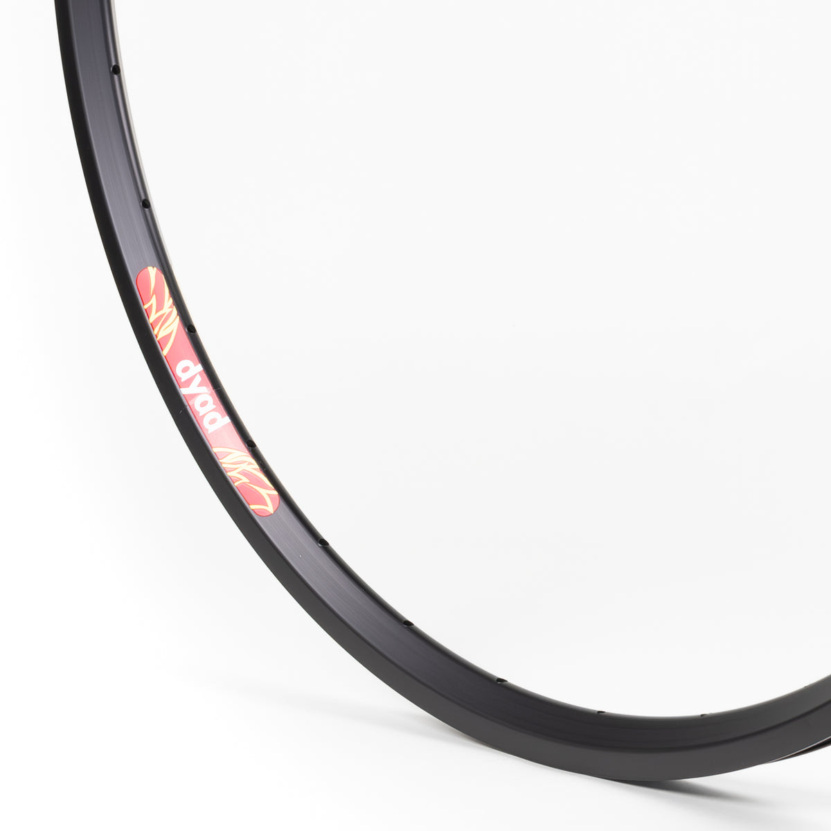 Velocity USA Dyad Black bicycle rim, close-up shot on a white background