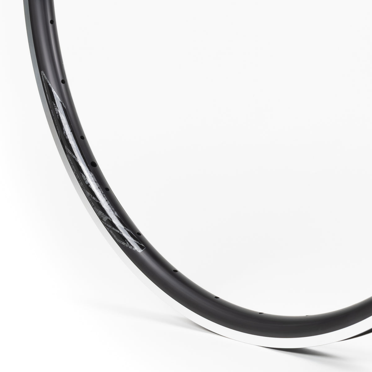 Velocity USA Quill Black Machined Sidewall bicycle rim, close-up shot on a white background
