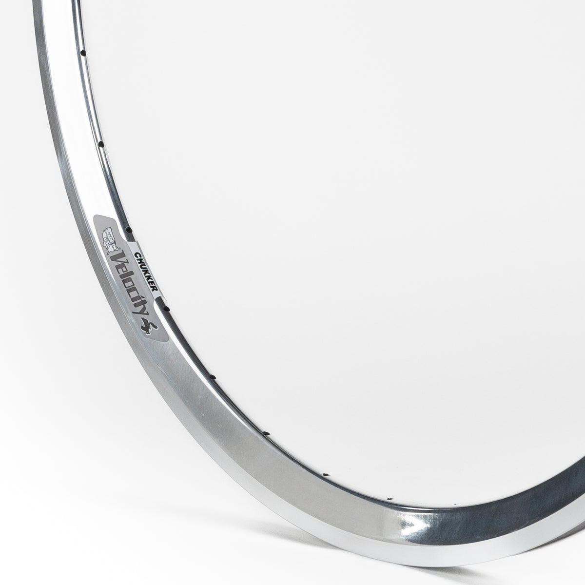 Velocity USA Chukker Polished Machined Sidewall bicycle rim, close-up shot on a white background