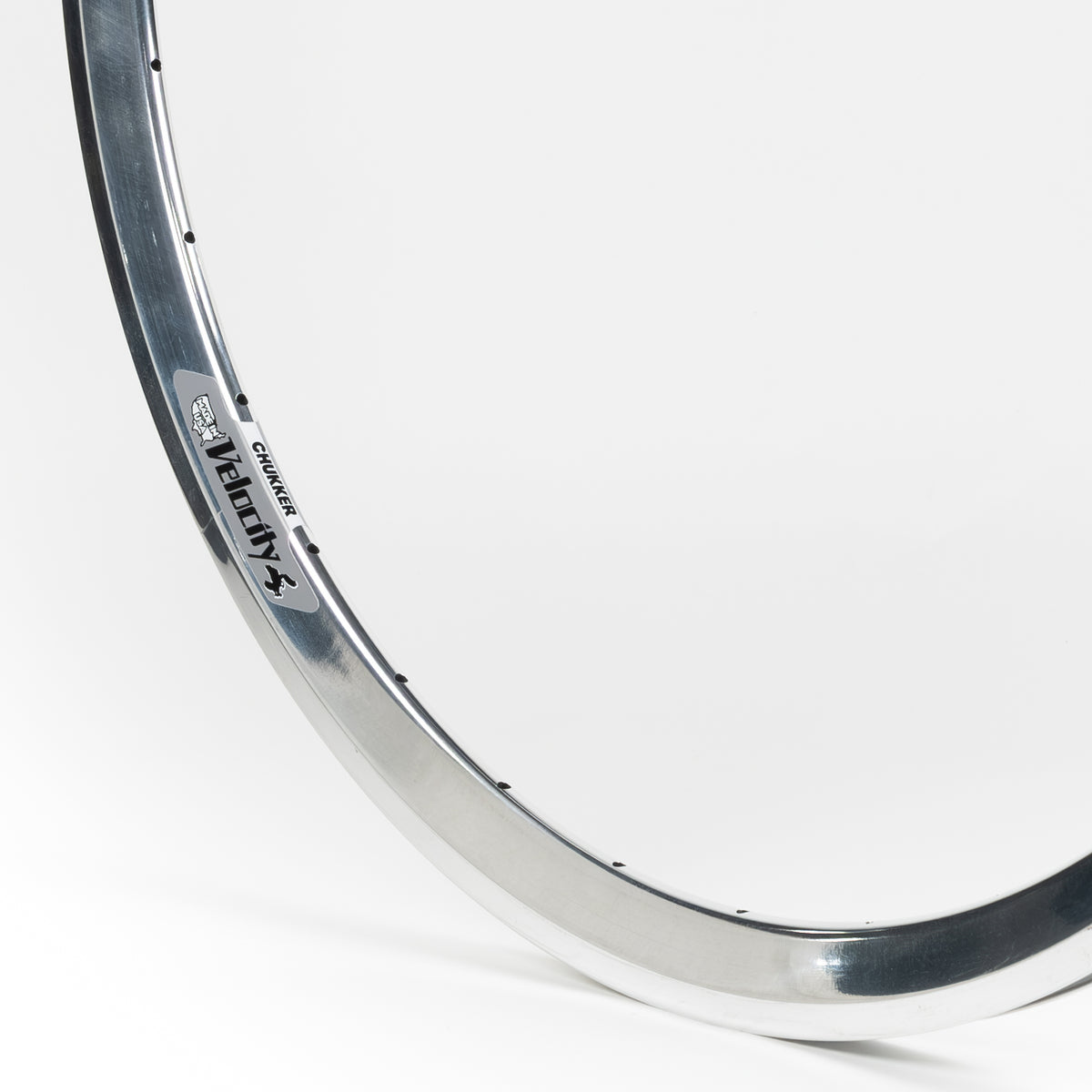 Velocity USA Chukker Polished bicycle rim, close-up shot on a white background