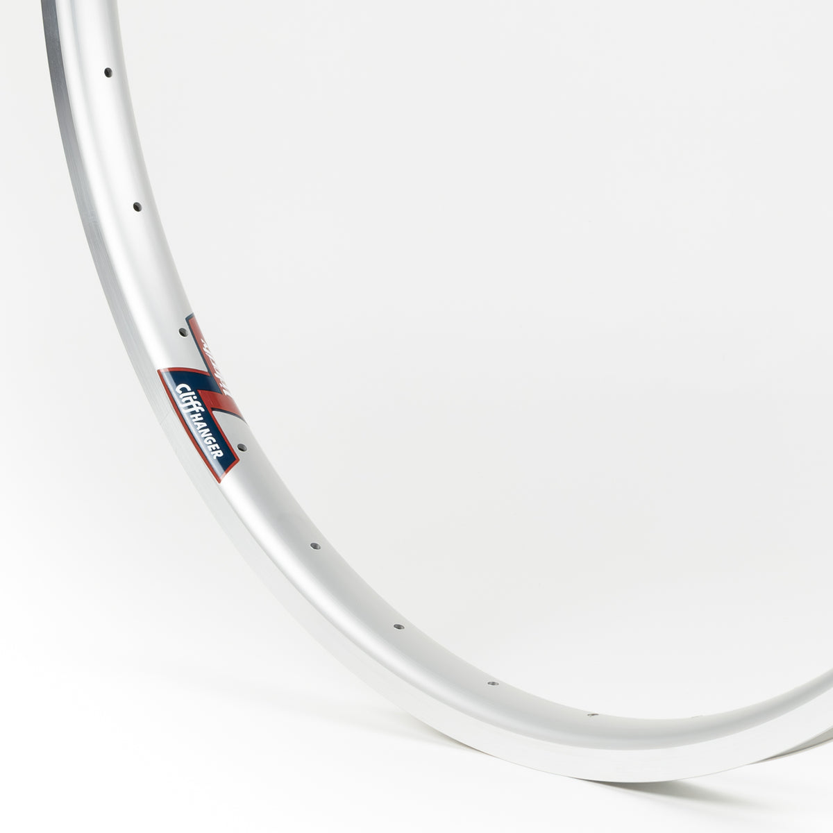 Velocity USA Cliffhanger Silver Machined Sidewall bicycle rim, close-up shot on a white background