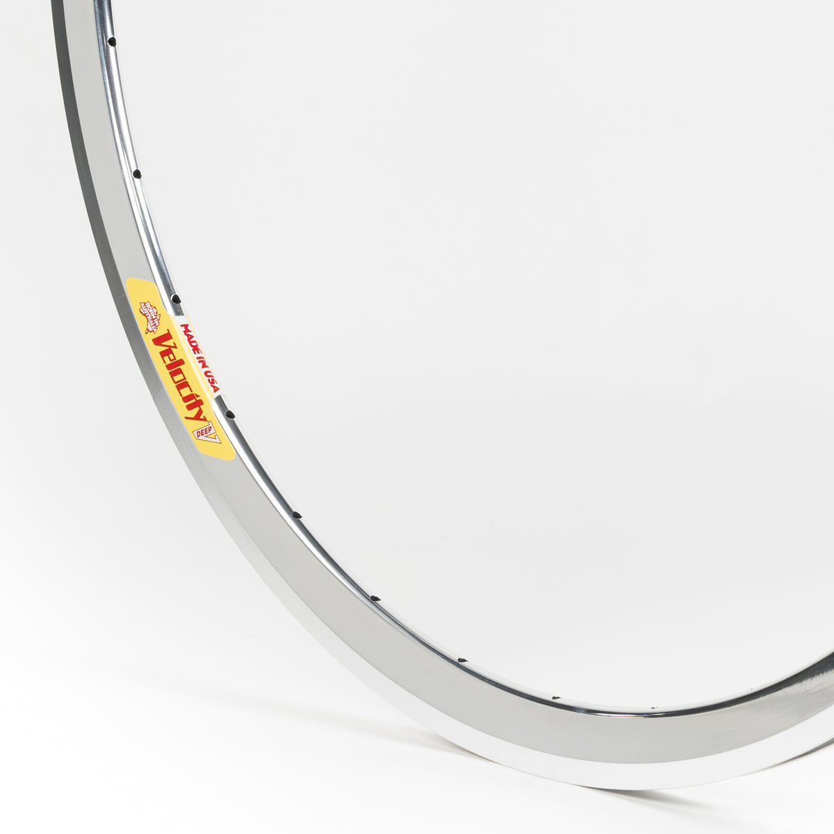 Velocity USA Deep V Polished Machined Sidewall bicycle rim, close-up shot on a white background