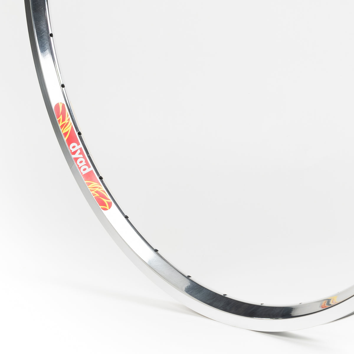 Velocity USA Dyad Polished Machined Sidewall bicycle rim, close-up shot on a white background