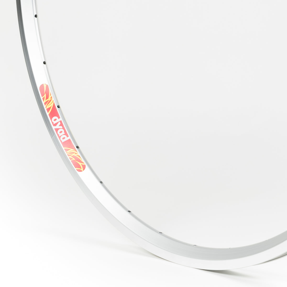 Velocity USA Dyad Silver Machined Sidewall bicycle rim, close-up shot on a white background
