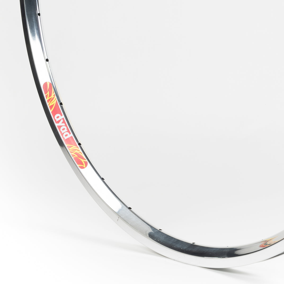Velocity USA Dyad Polished bicycle rim, close-up shot on a white background