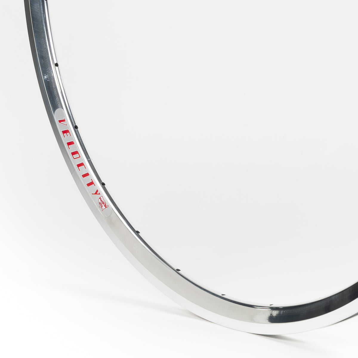 Velocity USA Fusion Polished Machined Sidewall bicycle rim, close-up shot on a white background