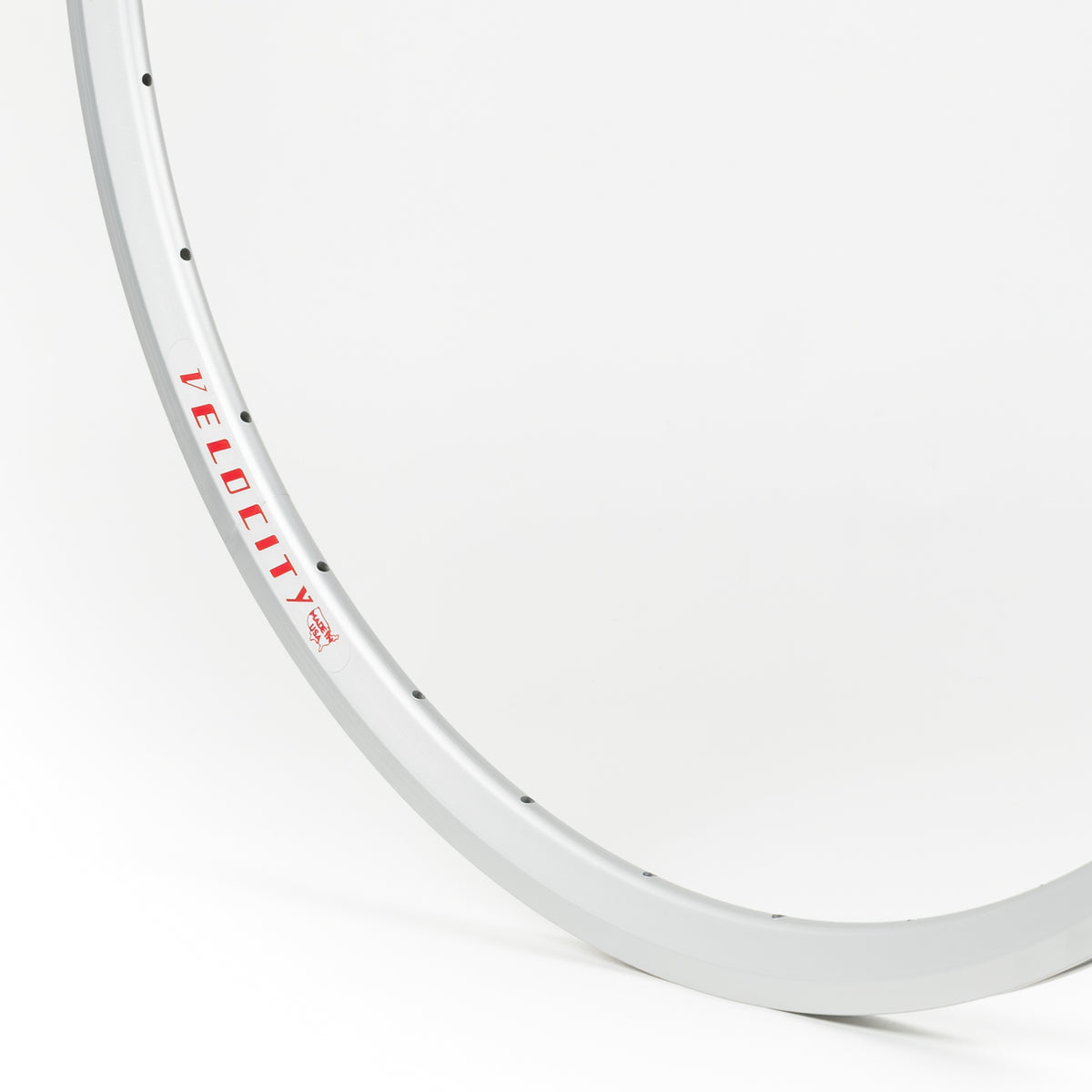 Velocity USA Fusion Silver bicycle rim, close-up shot on a white background