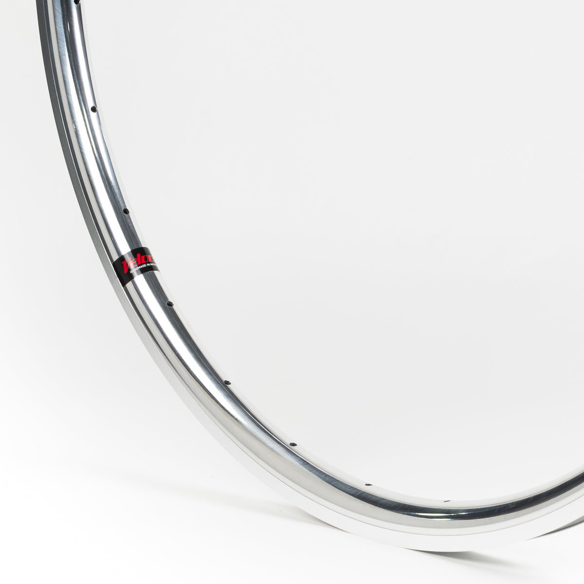 Velocity USA Quill Polished Machined Sidewall bicycle rim, close-up shot on a white background