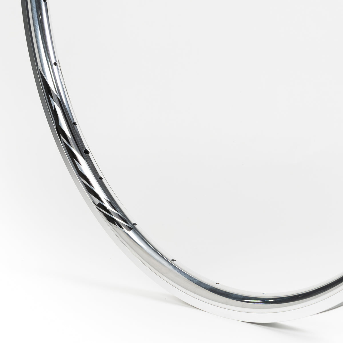 Velocity USA Quill Polished Machined Sidewall bicycle rim, close-up shot on a white background