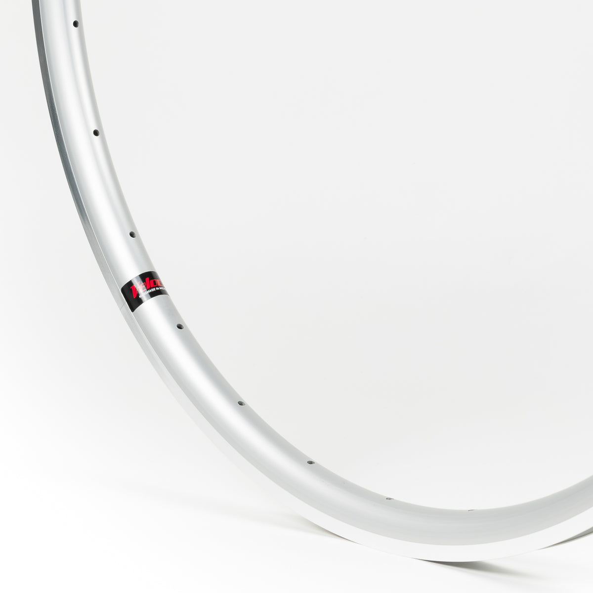 Velocity USA Quill Silver Machined Sidewall bicycle rim, close-up shot on a white background