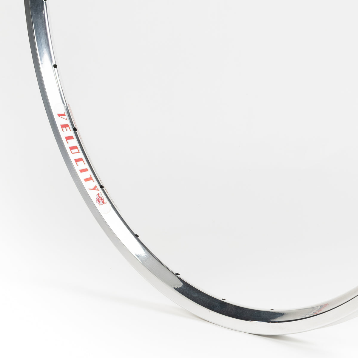 Velocity USA Major Tom Polished Machined Sidewall bicycle rim, close-up shot on a white background