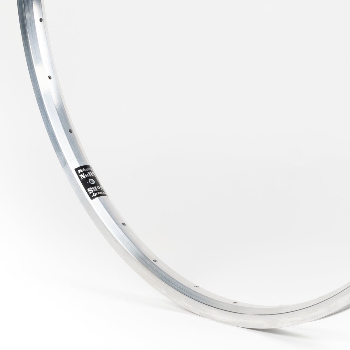 Velocity USA NoBS Mill Finish bicycle rim, close-up shot on a white background